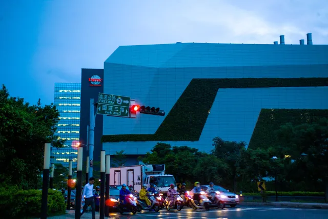 TSMC chip fabrication buildings in Hsinchu, Taiwan, at dusk