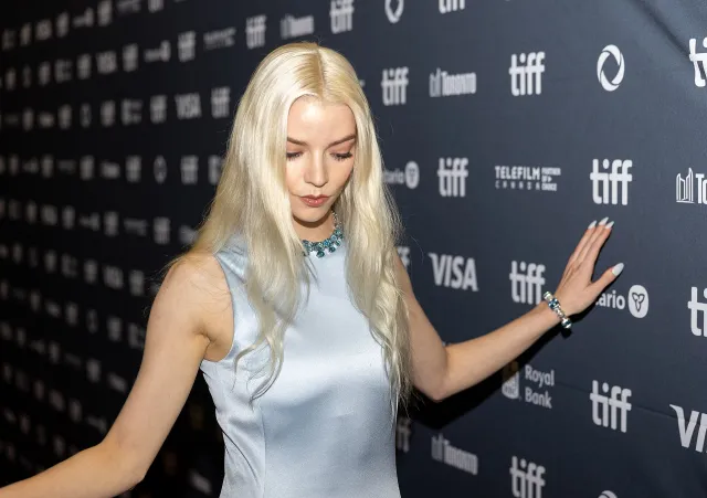 Anya Taylor-Joy in a pale blue satin dress on the red carpet at the Toronto International Film Festival