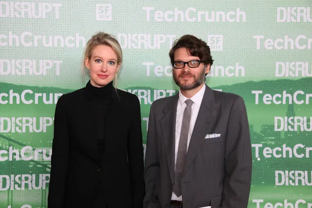 Elizabeth Holmes in a black turtleneck, standing backstage at TechCrunch Disrupt in San Francisco in 2014